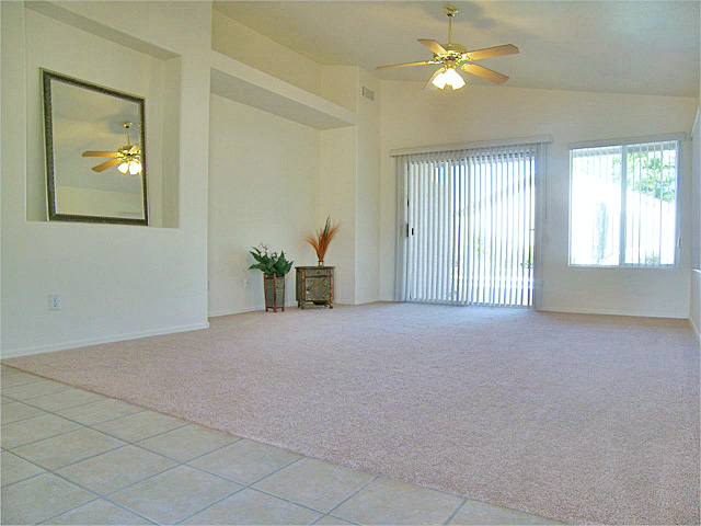 New carpet, freshly painted, ceiling fans throughout